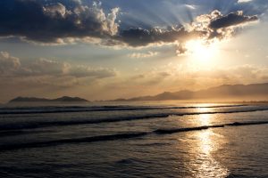 Por do sol na Praia do Indaia Bertioga Sao Paulo shutterstock 1844330038