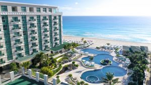 Como é se hospedar com a rede Sandos: que tal esta vista, hein? Pois este é o Sandos Cancun, de frente para uma praia de beleza cinematográfica em Cancún, no México | Crédito: Divulgação