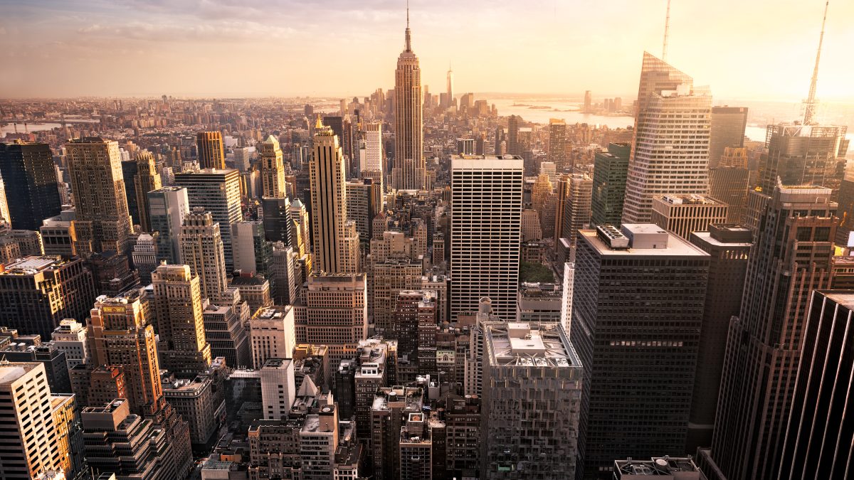 New,York,City,Skyline,With,Urban,Skyscrapers,At,Sunset,,Usa.
