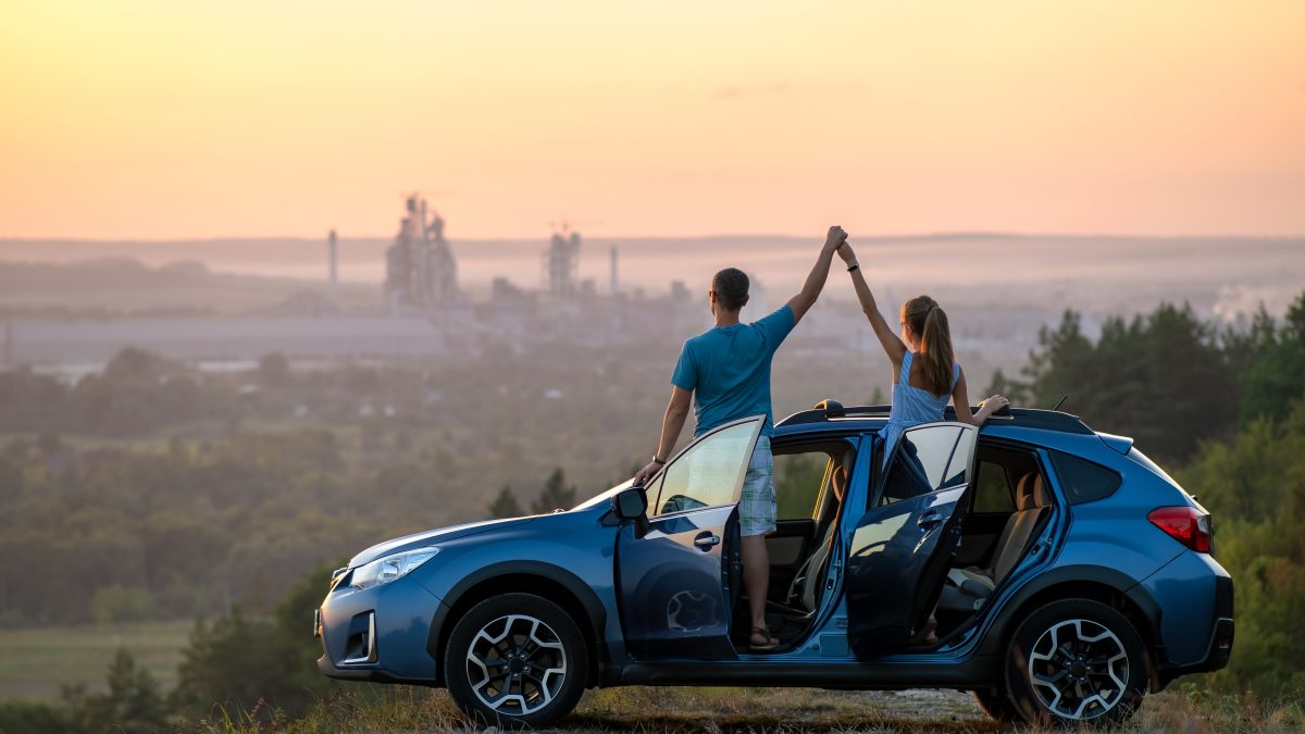 Happy,Couple,Spending,Time,Together,Near,Their,Suv,Car,During