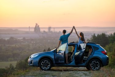 Happy,Couple,Spending,Time,Together,Near,Their,Suv,Car,During